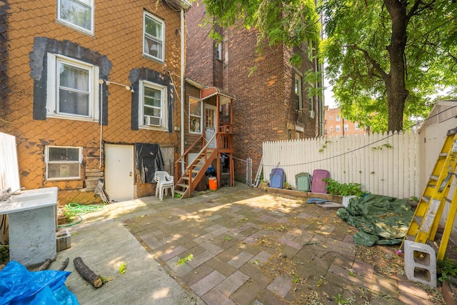 back of house with a patio area