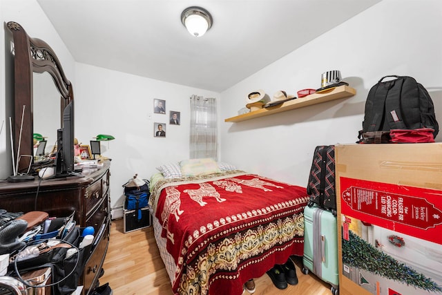 bedroom featuring wood-type flooring