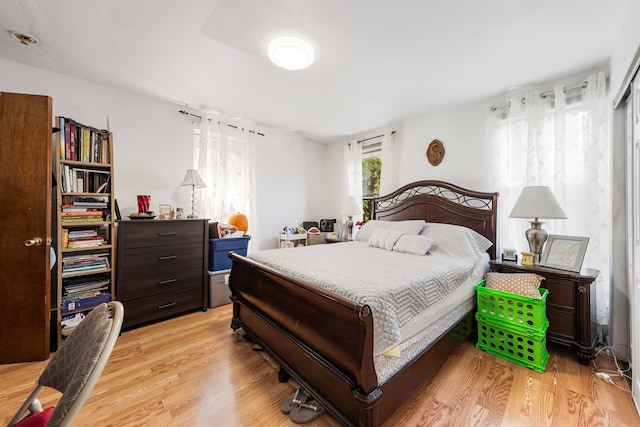 bedroom featuring light hardwood / wood-style floors