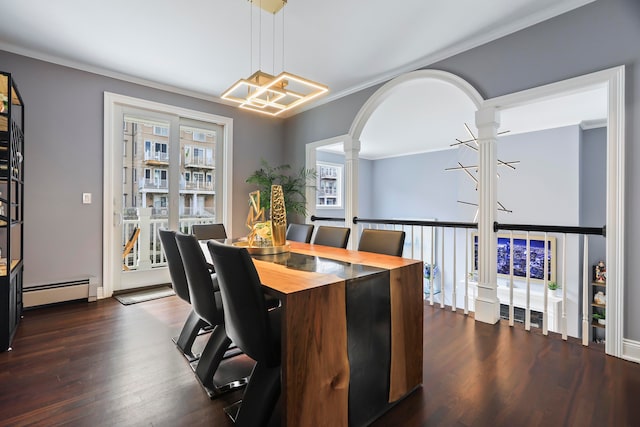 dining area featuring dark wood-type flooring, decorative columns, ornamental molding, and a baseboard radiator