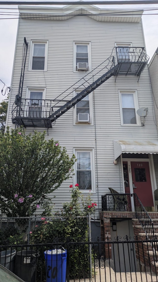 720 14th St Unit 6, Union City, NJ 07087 - view of front of house with a fenced front yard and cooling unit