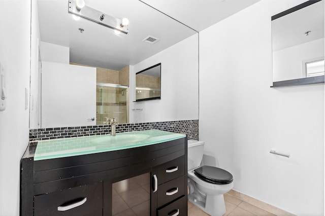 full bath with toilet, tile patterned floors, backsplash, visible vents, and a stall shower