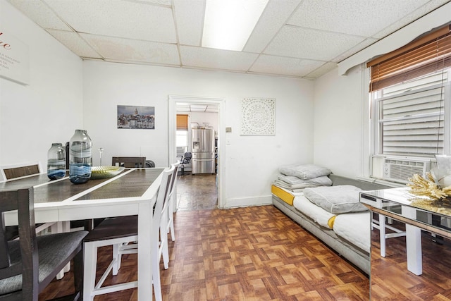 418 7th St, Union City, NJ 07087 - dining space with a drop ceiling, plenty of natural light, and cooling unit