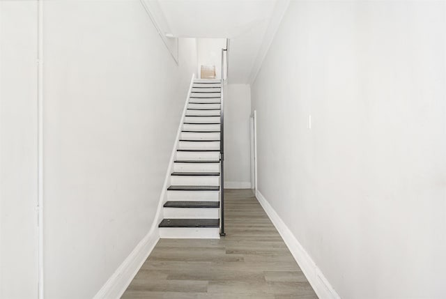 418 7th St, Union City, NJ 07087 - stairway with wood finished floors and baseboards
