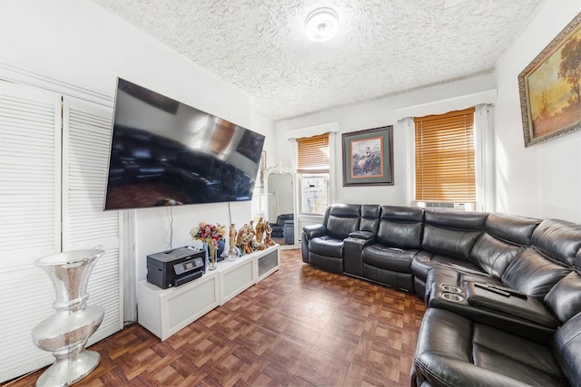 418 7th St, Union City, NJ 07087 - living area featuring a textured ceiling and healthy amount of natural light