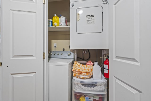8901 Newkirk Ave, North Bergen, NJ 07047 - laundry room featuring stacked washing machine and dryer