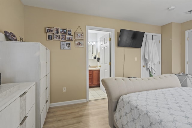 8901 Newkirk Ave, North Bergen, NJ 07047 - bedroom featuring light wood finished floors, ensuite bathroom, and a closet