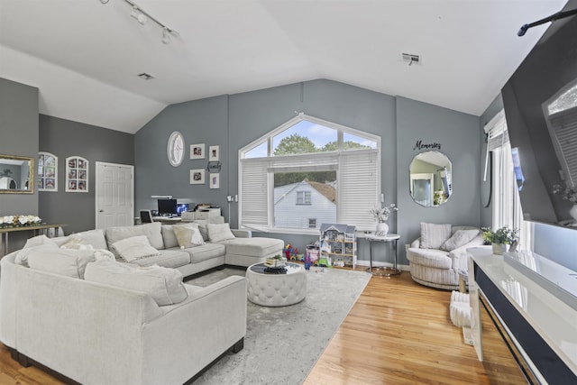 8901 Newkirk Ave, North Bergen, NJ 07047 - living room with lofted ceiling, wood finished floors, and an office area