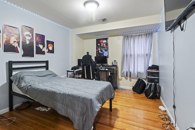 8901 Newkirk Ave, North Bergen, NJ 07047 - bedroom with wood finished floors and baseboards