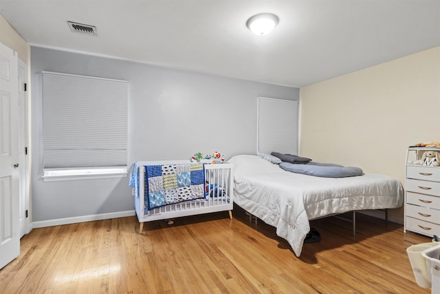8901 Newkirk Ave, North Bergen, NJ 07047 - bedroom with wood finished floors and baseboards
