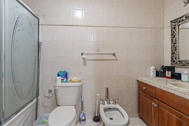 8901 Newkirk Ave, North Bergen, NJ 07047 - full bathroom featuring tile walls, vanity, a bidet, and enclosed tub / shower combo