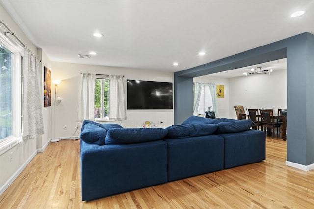 8901 Newkirk Ave, North Bergen, NJ 07047 - living area with light wood-style flooring, recessed lighting, and a chandelier