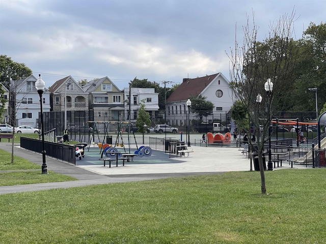 12 Audubon Ave Unit 305, Jersey City, NJ 07305 - view of home's community featuring fence, a lawn, and a residential view