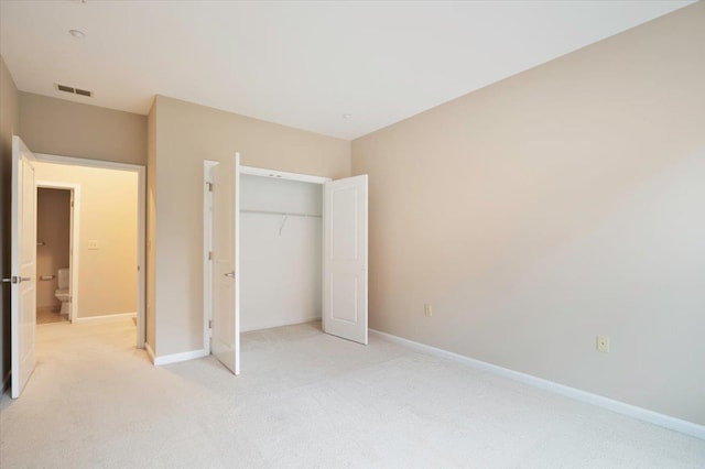 25 Duncan Ave Unit 210, Jersey City, NJ 07304 - unfurnished bedroom featuring light colored carpet and a closet