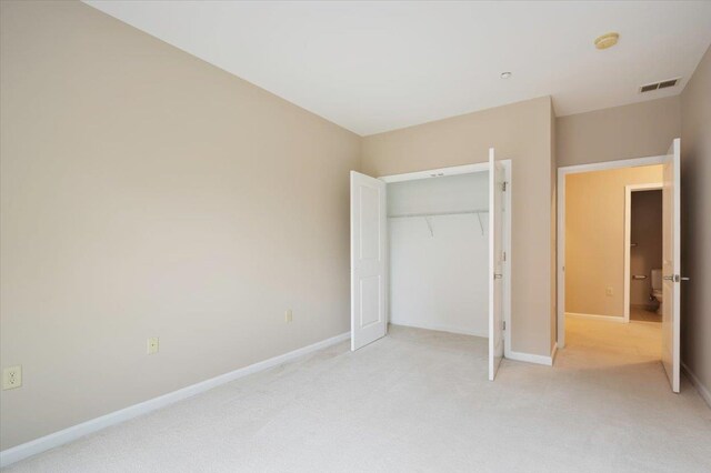 25 Duncan Ave Unit 210, Jersey City, NJ 07304 - unfurnished bedroom with light carpet and a closet