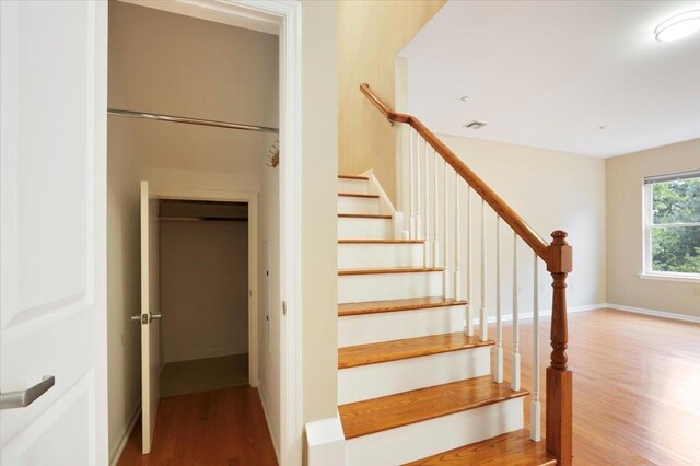 25 Duncan Ave Unit 210, Jersey City, NJ 07304 - stairway with wood finished floors and baseboards