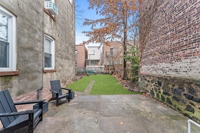 view of patio / terrace with fence