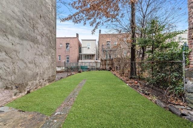 view of yard with fence