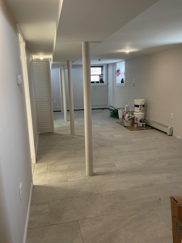 148 Nesbit St, Weehawken, NJ 07086 - below grade area with baseboard heating and baseboards