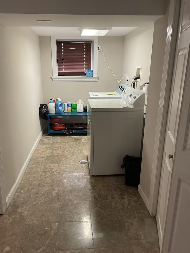 148 Nesbit St, Weehawken, NJ 07086 - laundry room with washing machine and dryer and baseboards