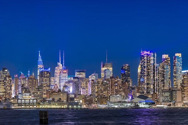 property's view of city featuring a water view