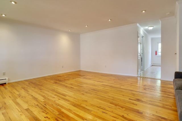 1445 68th St Unit A, North Bergen, NJ 07047 - spare room with crown molding, light wood-type flooring, recessed lighting, and a baseboard radiator