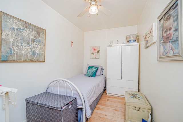 bedroom featuring ceiling fan and light wood finished floors