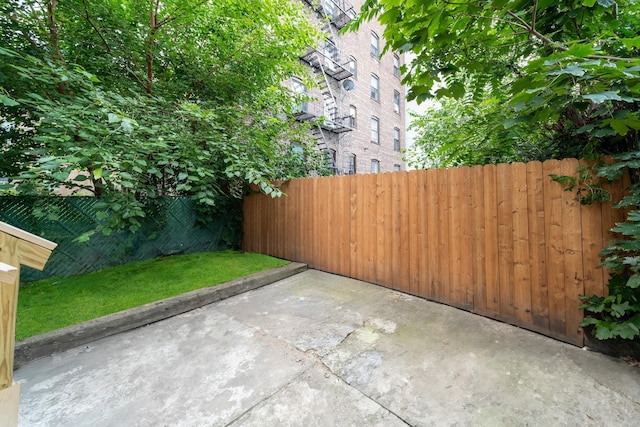 view of patio / terrace with fence