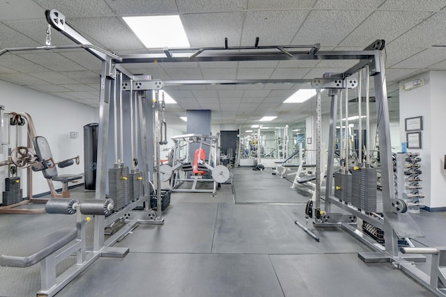 workout area with a drop ceiling