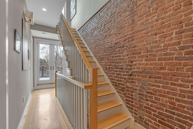 157 8th St, Hoboken, NJ 07030 - staircase with wood finished floors and recessed lighting