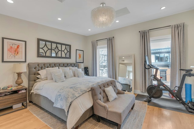 157 8th St, Hoboken, NJ 07030 - bedroom with light wood-style flooring and recessed lighting
