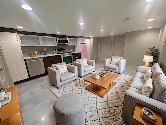 157 8th St, Hoboken, NJ 07030 - living room featuring bar with sink, recessed lighting, and light tile patterned flooring