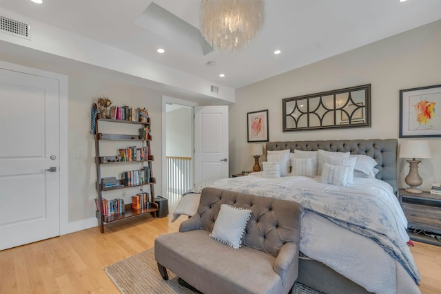 157 8th St, Hoboken, NJ 07030 - bedroom featuring light wood-style flooring, a chandelier, and recessed lighting