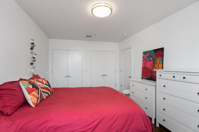 bedroom featuring dark hardwood / wood-style floors