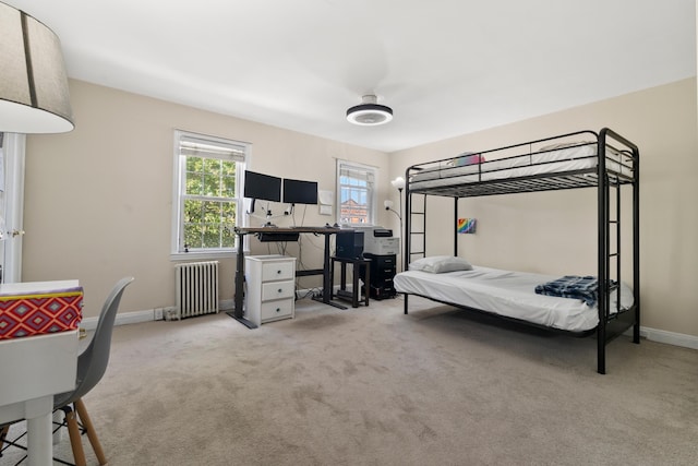 104 W 52nd St, Bayonne, NJ 07002 - carpeted bedroom featuring radiator and baseboards