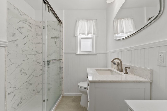 104 W 52nd St, Bayonne, NJ 07002 - bathroom with vanity, a marble finish shower, and wainscoting