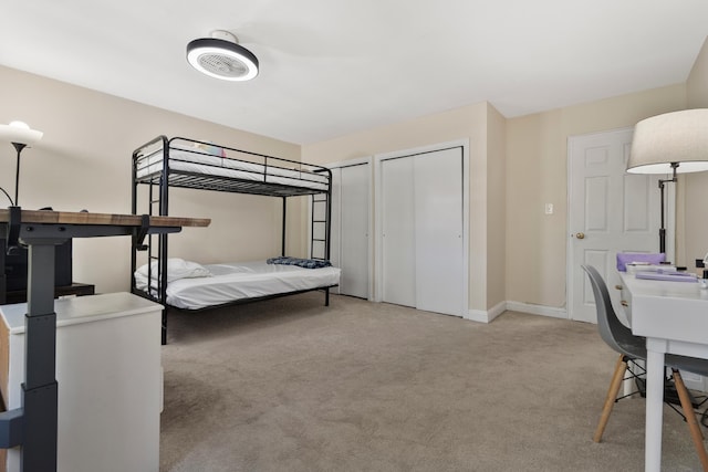 104 W 52nd St, Bayonne, NJ 07002 - bedroom with light carpet and two closets