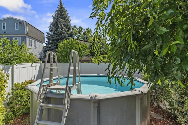 104 W 52nd St, Bayonne, NJ 07002 - view of swimming pool with a fenced backyard