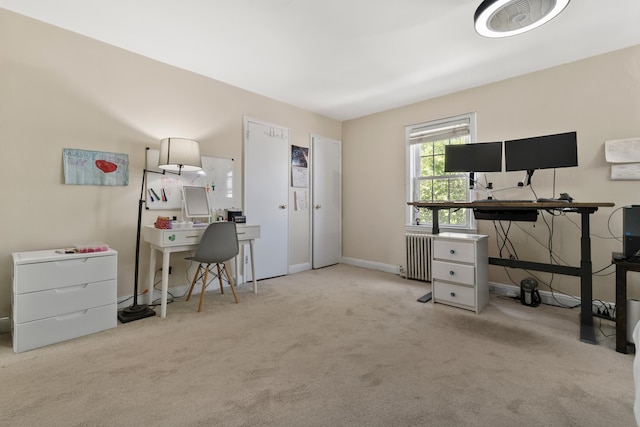 104 W 52nd St, Bayonne, NJ 07002 - carpeted office space with radiator heating unit and baseboards