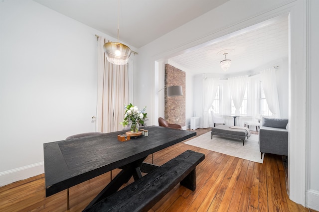27 48th St, Weehawken, NJ 07086 - dining space with wood-type flooring and baseboards