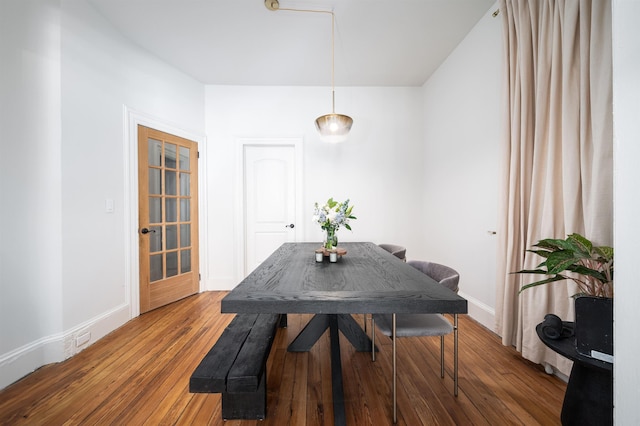 27 48th St, Weehawken, NJ 07086 - dining area with baseboards and wood finished floors