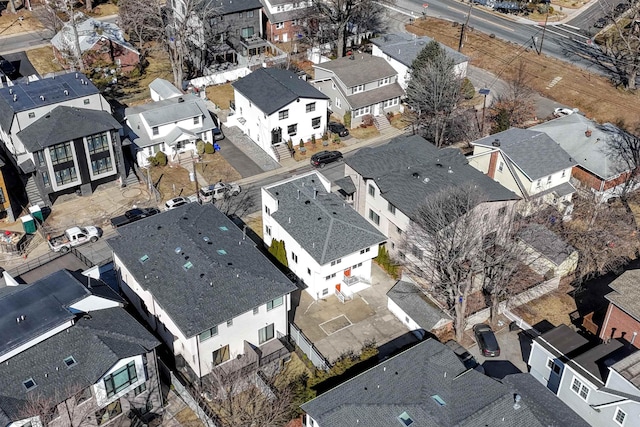 birds eye view of property with a residential view