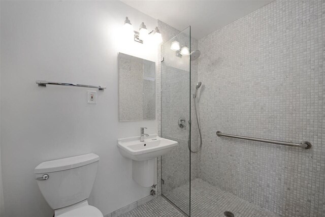 100 Manhattan Ave Unit 205, Union City, NJ 07087 - bathroom featuring toilet and tiled shower