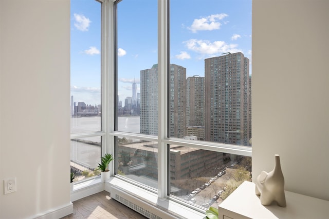 20 Newport Pkwy Unit 1707, Jersey City, NJ 07310 - detailed view of city skyline, a baseboard radiator, and nearby water
