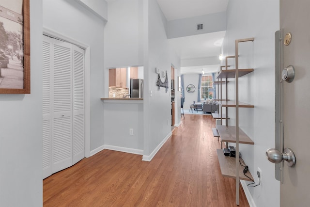 187 Wayne St Unit 106C, Jersey City, NJ 07302 - corridor with light wood finished floors and baseboards