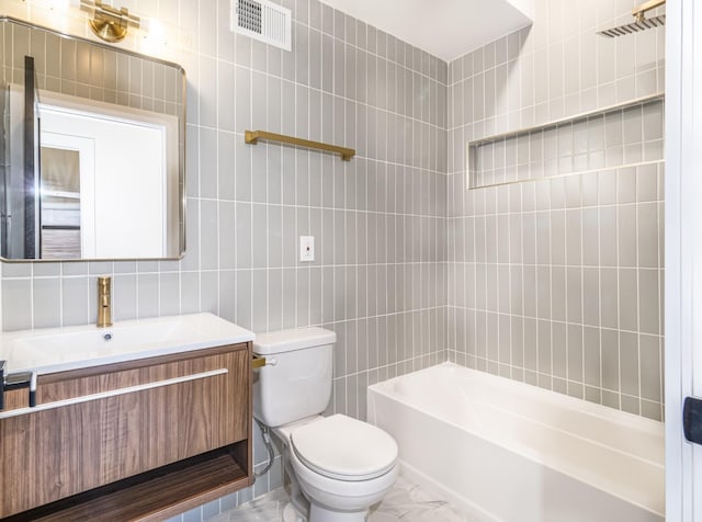 full bathroom featuring backsplash, tile walls, toilet, vanity, and shower / bathtub combination