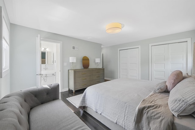 65 Dillingham Pl, Englewood Cliffs, NJ 07632 - bedroom featuring visible vents, baseboards, a closet, connected bathroom, and dark wood-type flooring