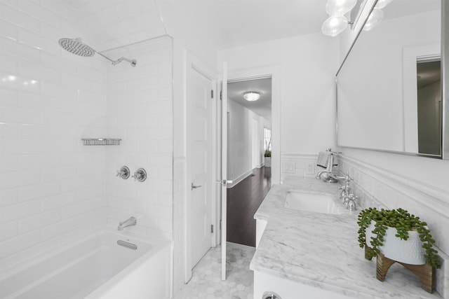 65 Dillingham Pl, Englewood Cliffs, NJ 07632 - bathroom featuring bathing tub / shower combination, vanity, and a wainscoted wall