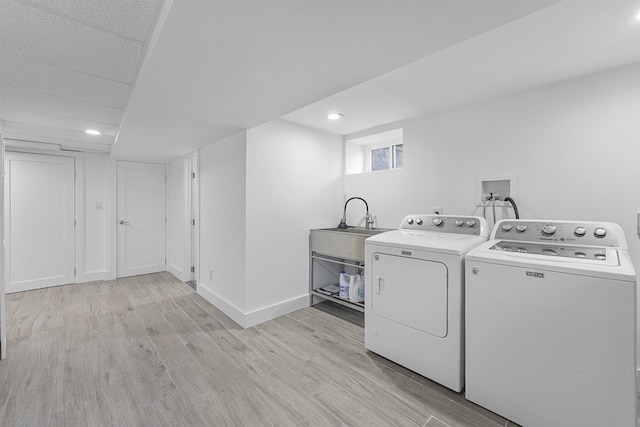65 Dillingham Pl, Englewood Cliffs, NJ 07632 - laundry room with baseboards, recessed lighting, light wood-style floors, laundry area, and washer and dryer