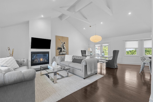 65 Dillingham Pl, Englewood Cliffs, NJ 07632 - living area featuring a glass covered fireplace, baseboards, beam ceiling, dark wood finished floors, and high vaulted ceiling